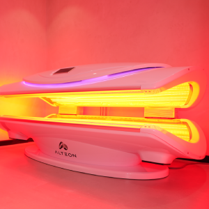 Alteon red light therapy bed glowing with LED panels at HBOT Wellness Centre